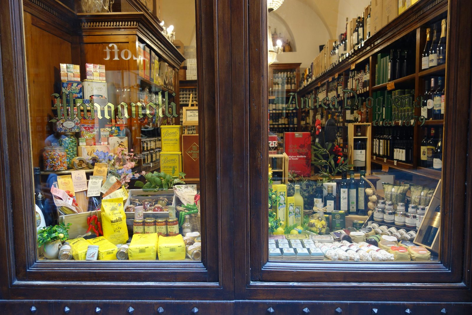 Window of a well-stocked Italian specialty food shop